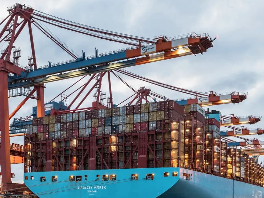 Container ship being loaded at a port terminal